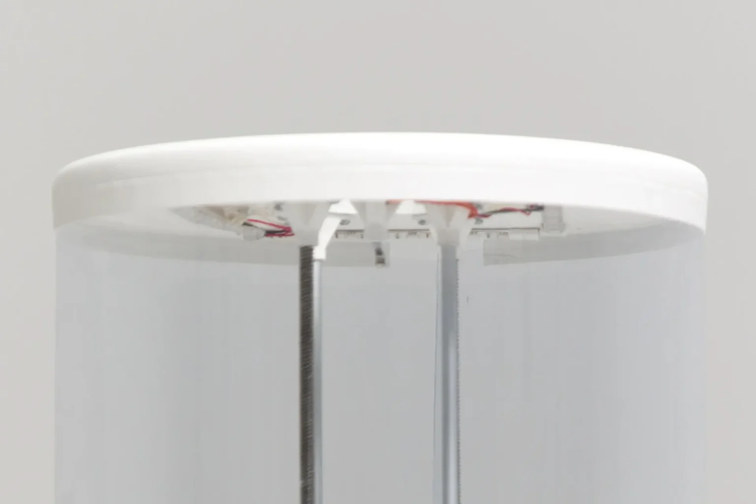 Detail of upper part of the machine with bottle entry sensor and mechanism